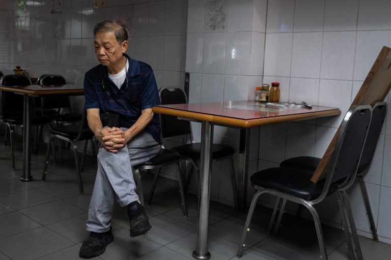 A Vencedora's Lam Kok Lon pauses for a reflective moment before the rush of dinner service begins