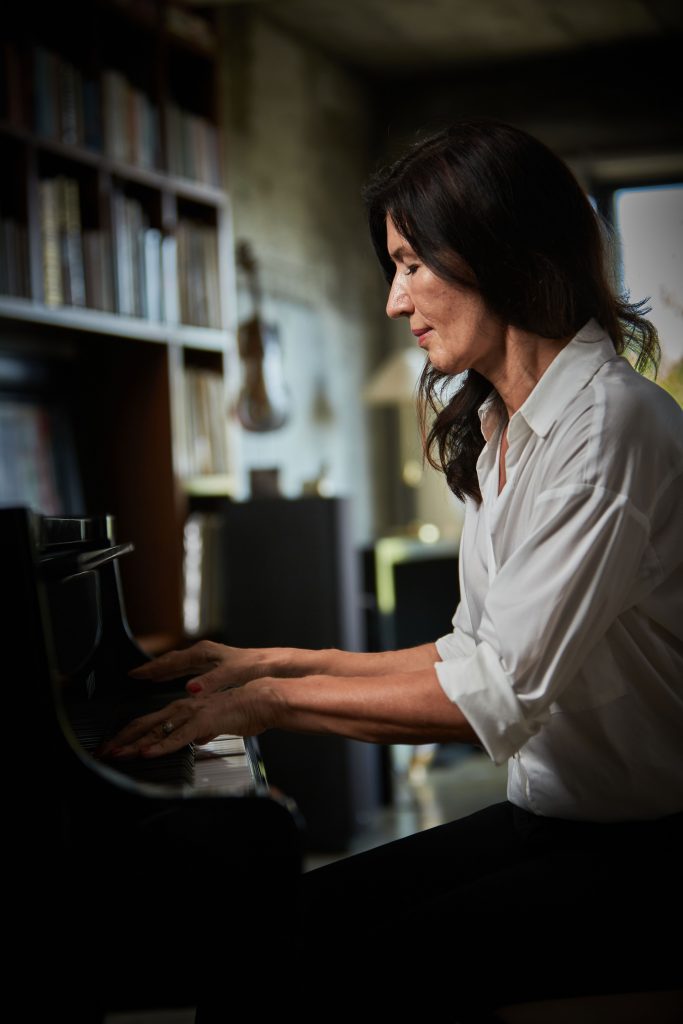 Galina Bessmertny plays on her piano